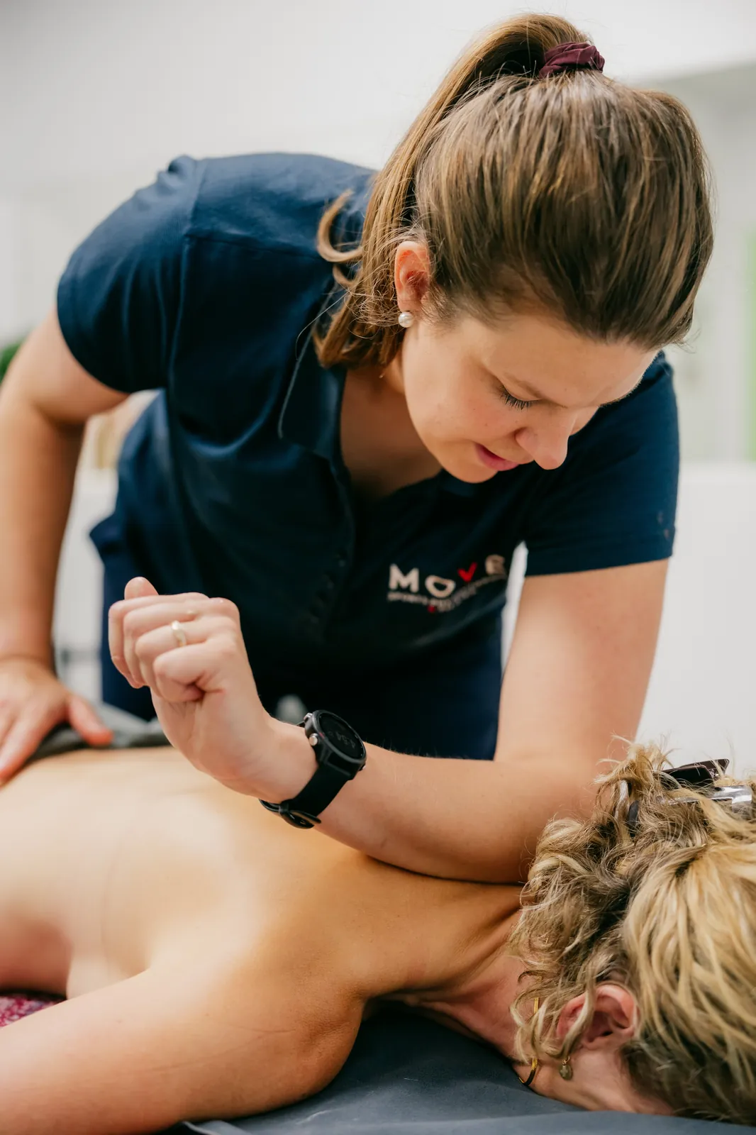 Physiotherapist treating a client with neck pain in Geelong